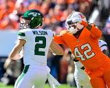 Broncos acquiring New York Jets QB Zach Wilson in pick swap 