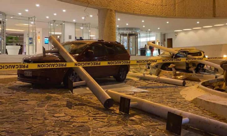 Cars were damaged outside a hotel in Acapulco after a 7.0 magnitude earthquake struck Mexico.