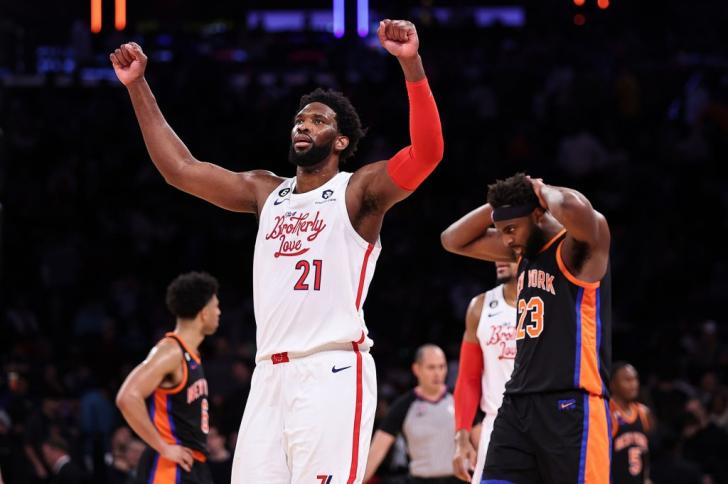 Joel Embiid #21 of the Philadelphia 76ers reacts during the fourth quarter of the game against the New York Knicks at Madison Square Garden on December 25, 2022 in New York City. 