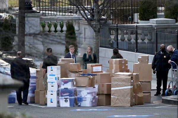 Boxes were moved out of the Eisenhower Executive Office building inside the White House complex near the end of President Donald J. Trump’s term. 